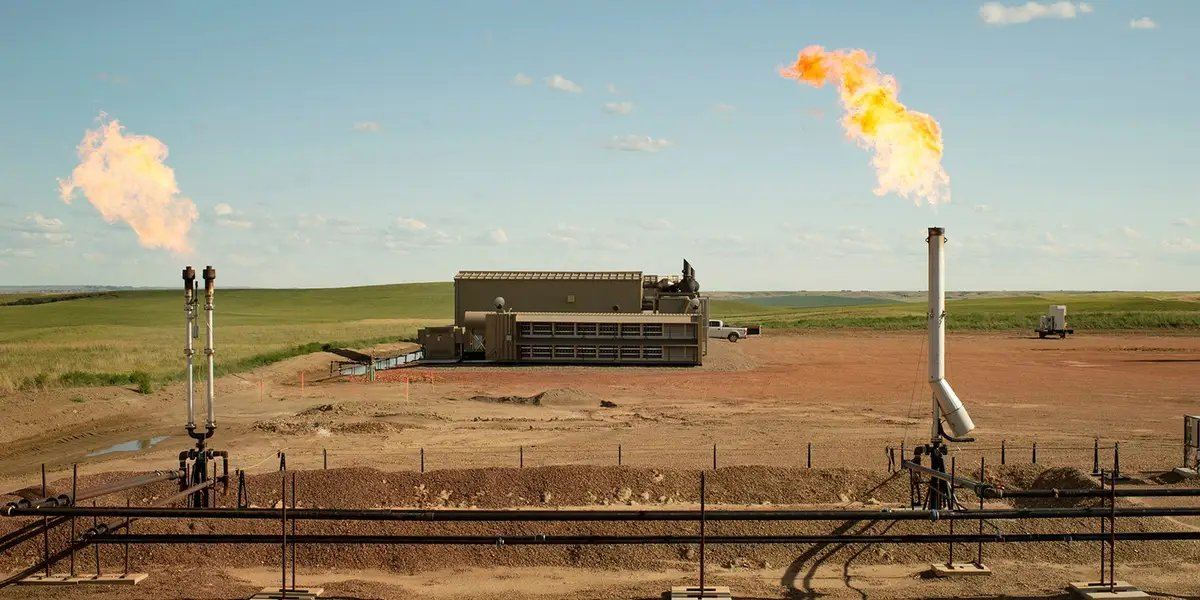 Natural gas flare stacks at an off-grid Bitcoin mining power facility in Russia